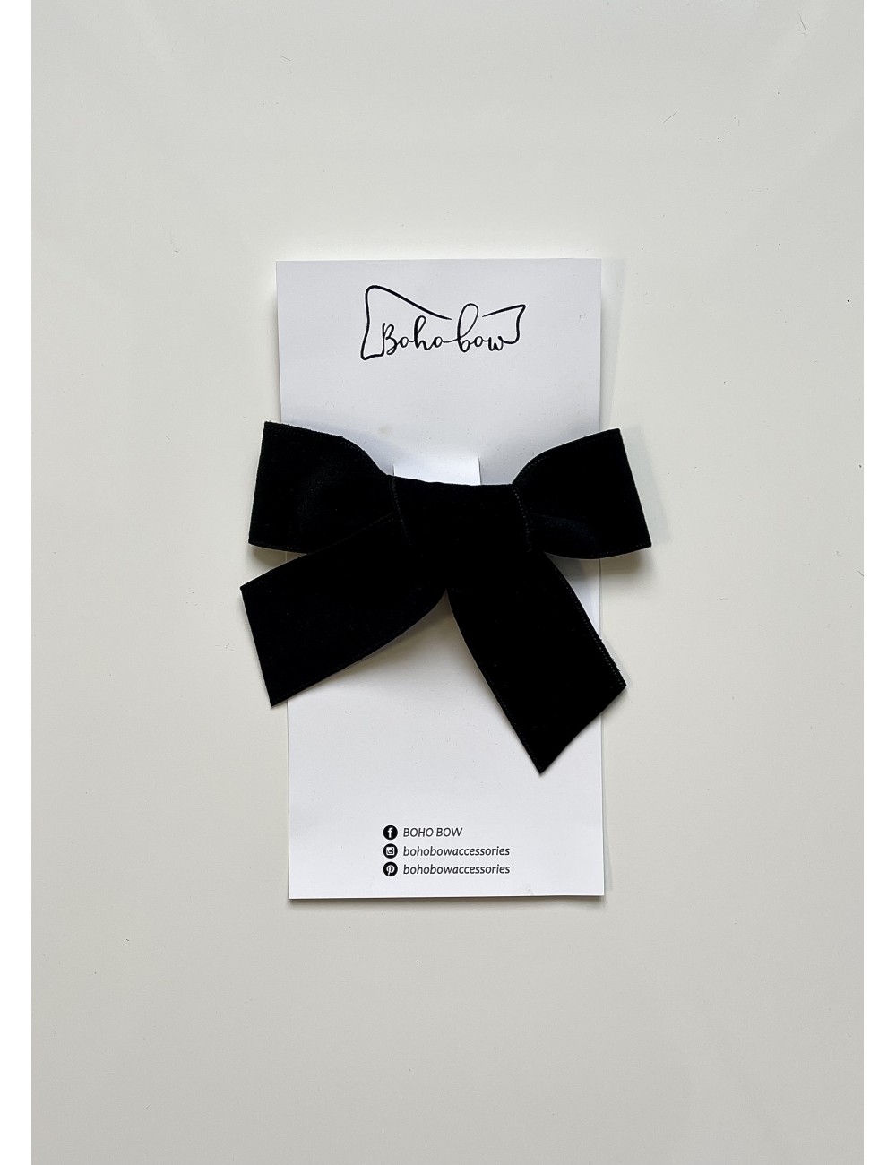 “Black velvet bow”